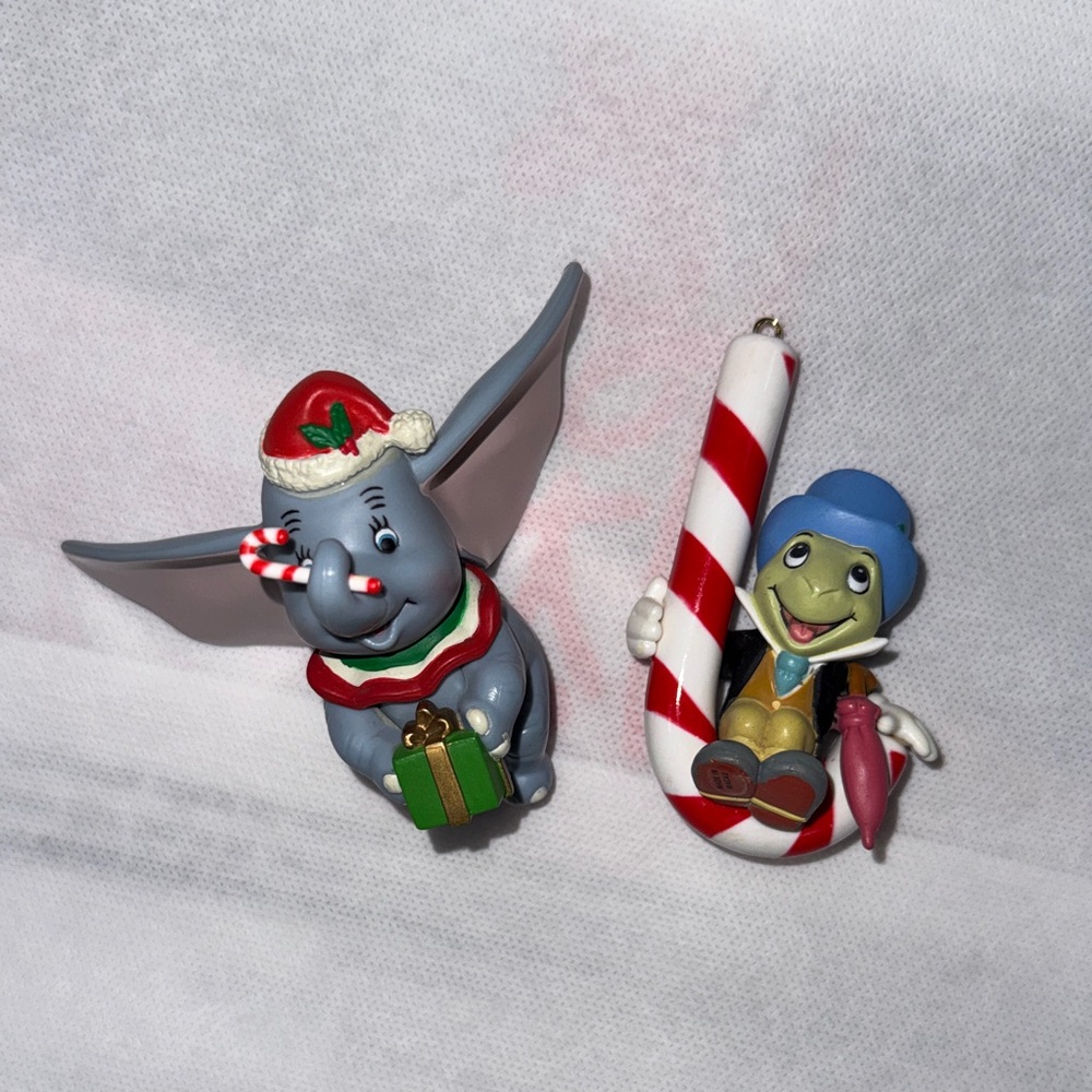 Vintage Grolier Disney 1967 Jiminy Cricket & 1988 Dumbo ornaments.